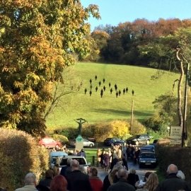 Silhouettes on the hill above the War Memorial in Stansted, Kent to celebrate the armistice centenary